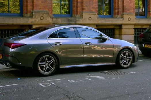 silver luxury sedan side view