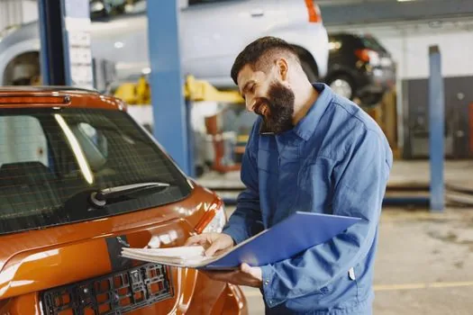 car owner checking online vehicle document laptop