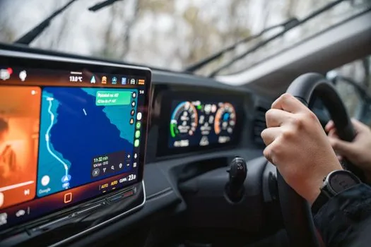 driver checking navigation traffic map before entering large Seoul hospital parking garage, realistic automotive interior photo