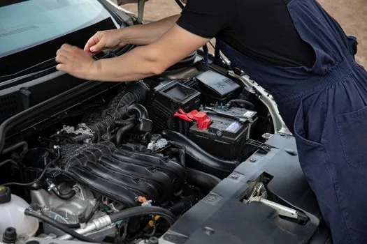 roadside assistance car battery service night parking lot