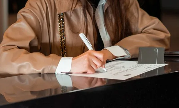 vehicle registration office counter used car paperwork