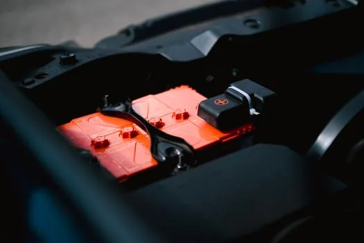 car dashboard thermometer showing extreme heat after airport parking, sunglasses and battery pack being removed from cabin, realistic automotive safety photo, no readable brand text